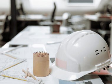 White Hard Hat Next to a Pen Holder